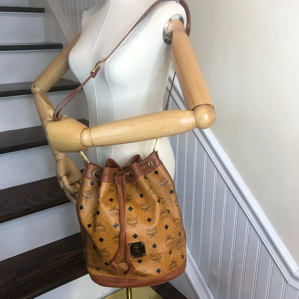 MCM Visetos Cognac Leather Monogram Bucket Drawstring Crossbody Bag EUC
